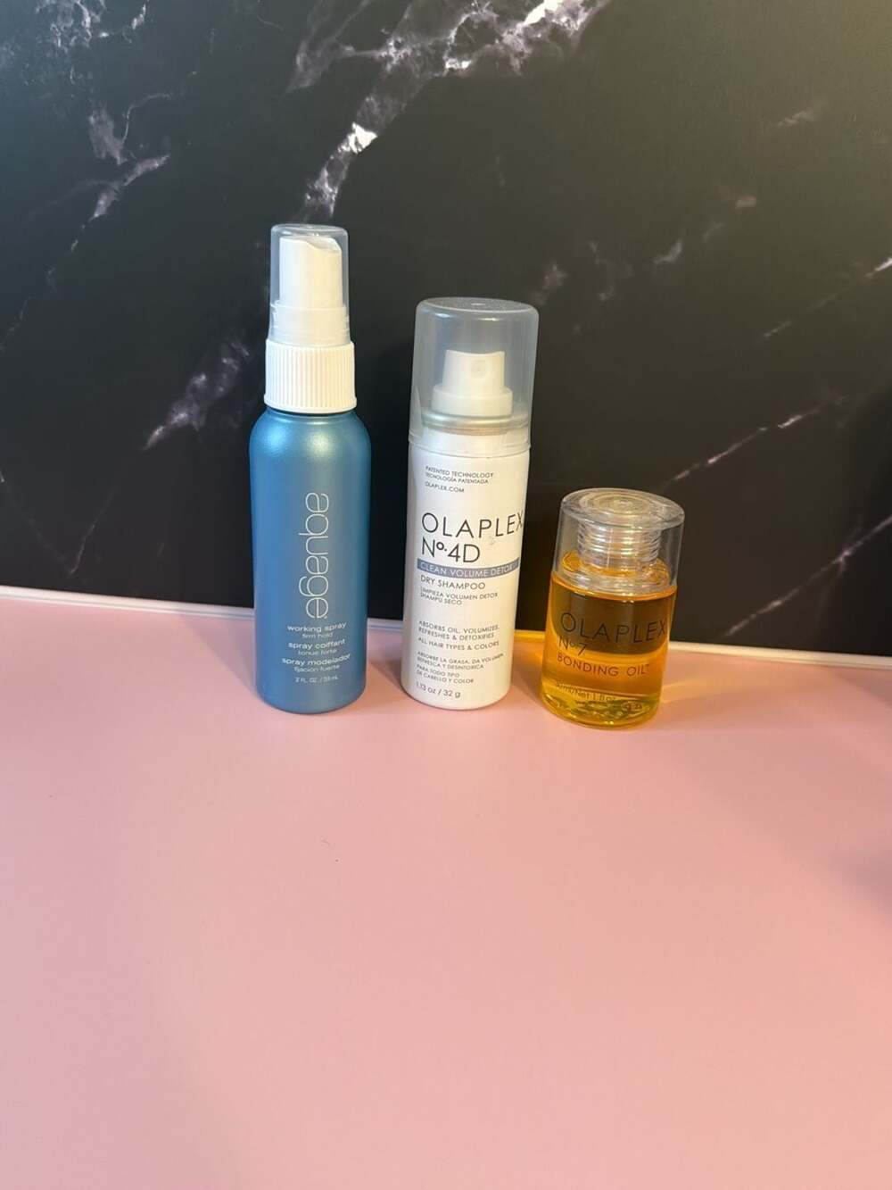 Aquage Working Spray, Olaplex No. 4D Dry Shampoo, and Olaplex No. 7 Bonding Oil